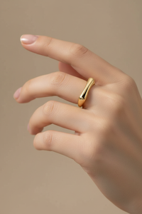 Gold ring on hand - full view