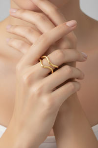 Gold ring on hand
