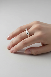 Silver ring on hand - full view